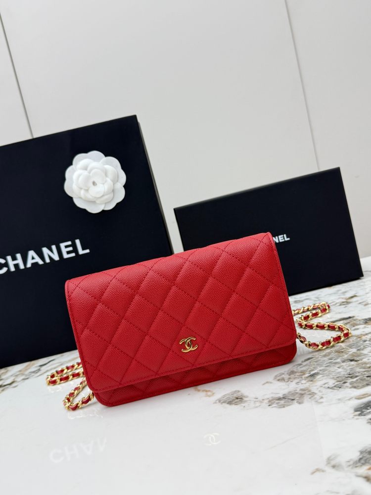 Chanel Wallet on Chain (WOC) crafted in bright red caviar leather with gold-tone hardware.