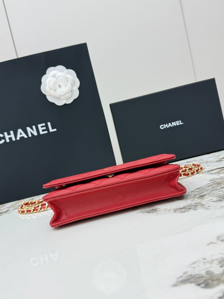 Chanel Wallet on Chain (WOC) crafted in bright red caviar leather with gold-tone hardware.
