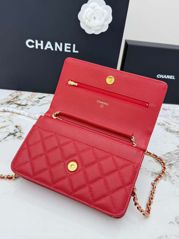 Chanel Wallet on Chain (WOC) crafted in bright red caviar leather with gold-tone hardware.