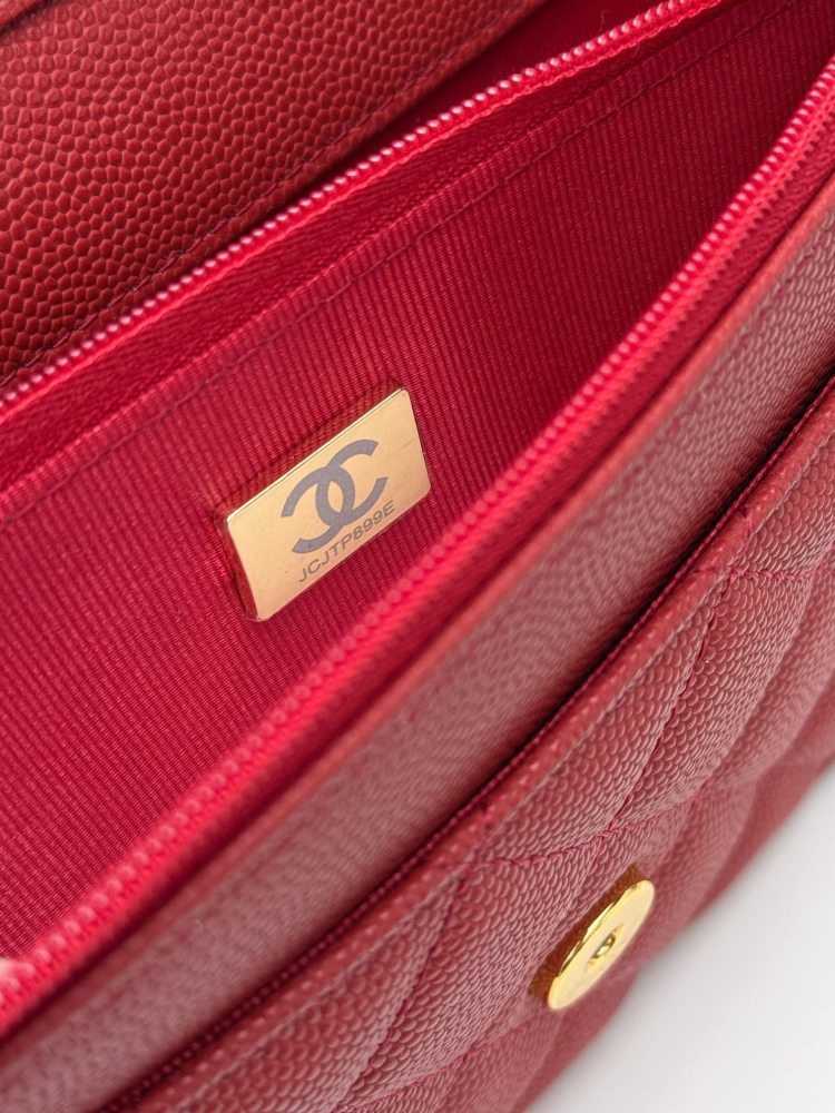 Chanel Wallet on Chain (WOC) crafted in bright red caviar leather with gold-tone hardware.