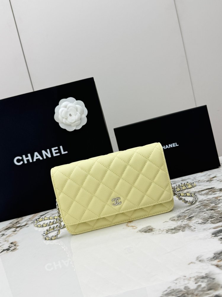 Chanel Wallet on Chain (WOC) crafted in lemon yellow caviar leather with silver-tone hardware.
