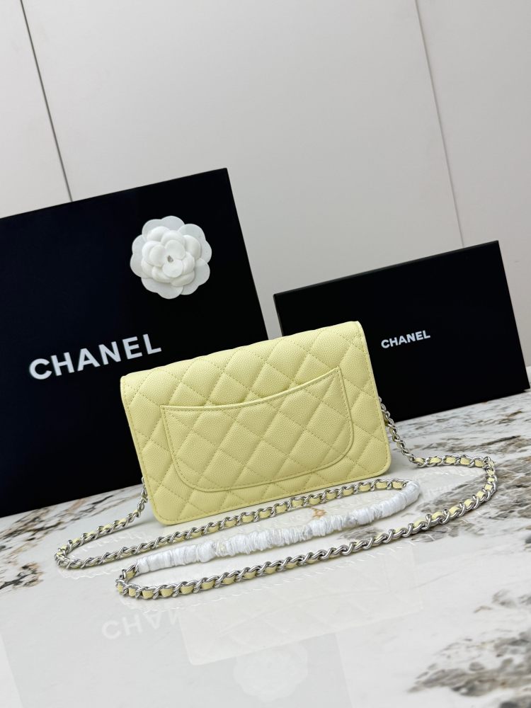Chanel Wallet on Chain (WOC) crafted in lemon yellow caviar leather with silver-tone hardware.