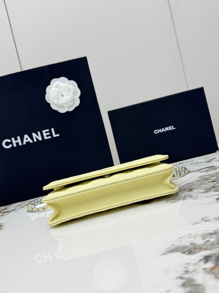 Chanel Wallet on Chain (WOC) crafted in lemon yellow caviar leather with silver-tone hardware.