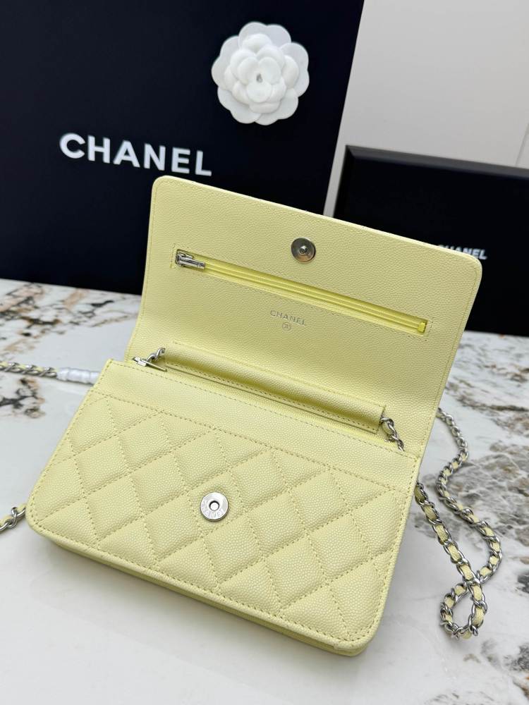 Chanel Wallet on Chain (WOC) crafted in lemon yellow caviar leather with silver-tone hardware.