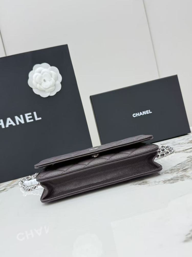 Chanel Wallet on Chain (WOC) crafted in dark brown caviar leather with silver-tone hardware