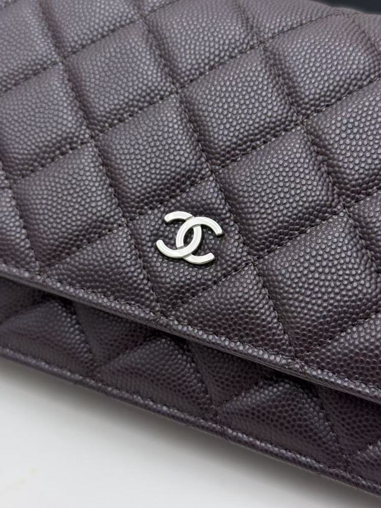 Chanel Wallet on Chain (WOC) crafted in dark brown caviar leather with silver-tone hardware