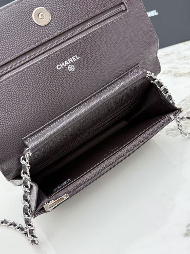 Chanel Wallet on Chain (WOC) crafted in dark brown caviar leather with silver-tone hardware