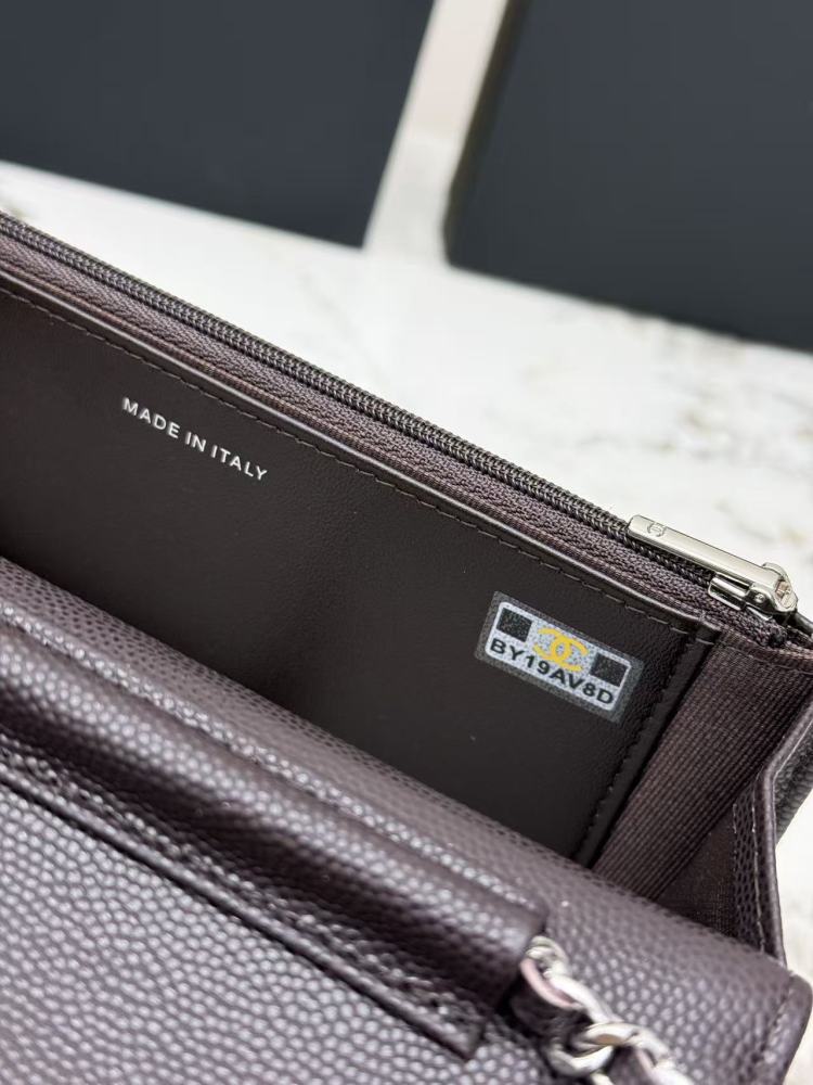 Chanel Wallet on Chain (WOC) crafted in dark brown caviar leather with silver-tone hardware