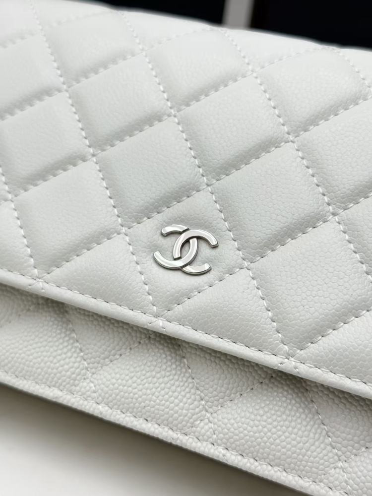 Chanel Wallet on Chain (WOC) crafted in white caviar leather with silver-tone hardware.