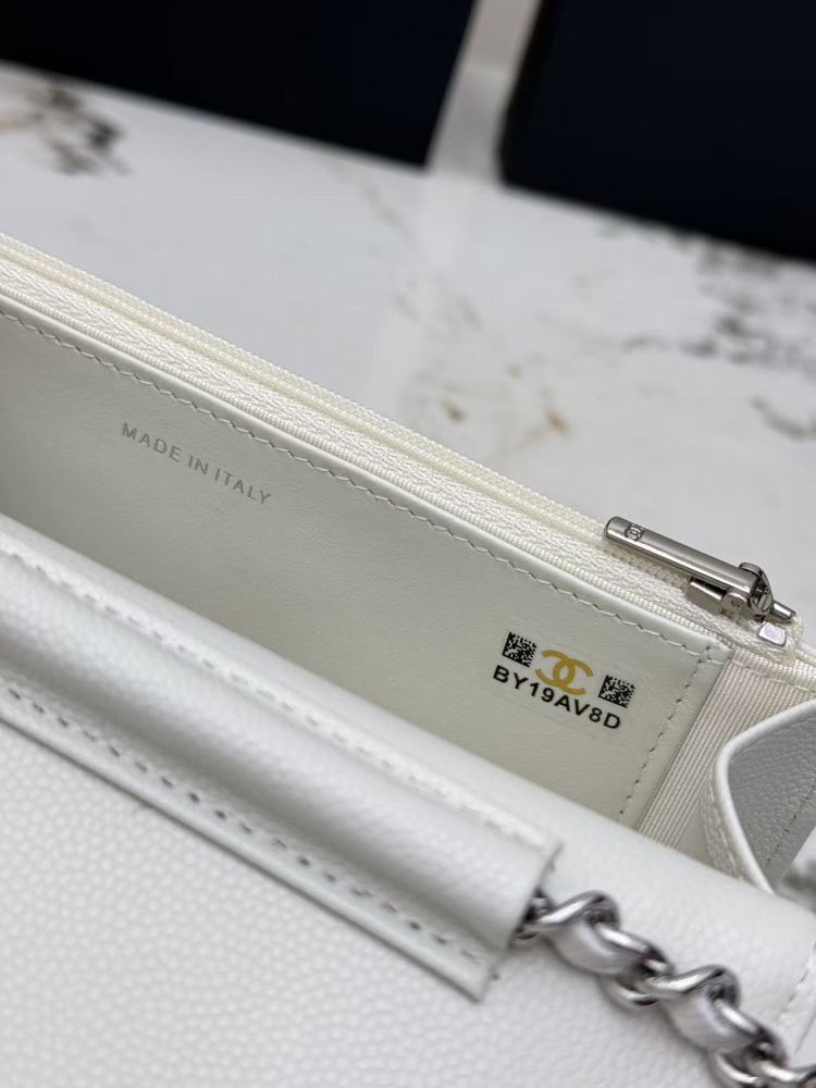 Chanel Wallet on Chain (WOC) crafted in white caviar leather with silver-tone hardware.