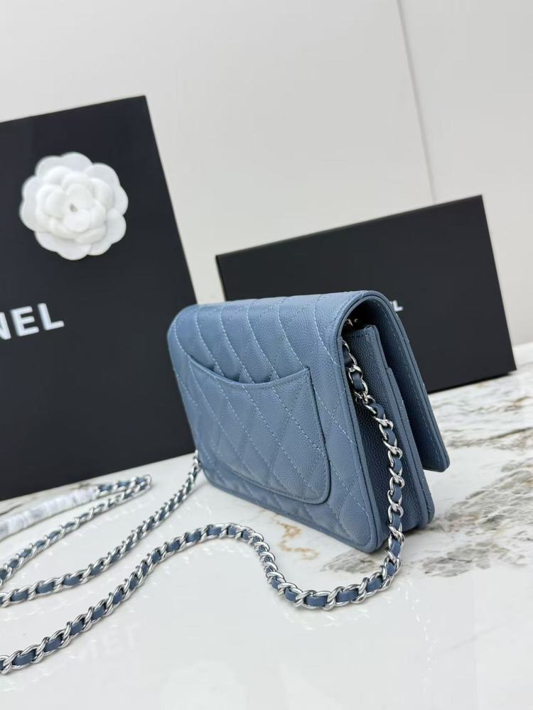 Chanel Wallet on Chain (WOC) crafted in haze blue caviar leather with silver-tone hardware.