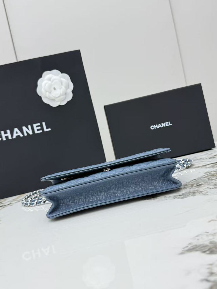 Chanel Wallet on Chain (WOC) crafted in haze blue caviar leather with silver-tone hardware.