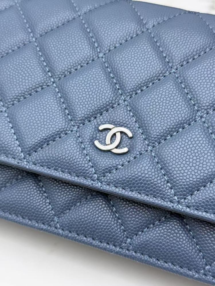 Chanel Wallet on Chain (WOC) crafted in haze blue caviar leather with silver-tone hardware.