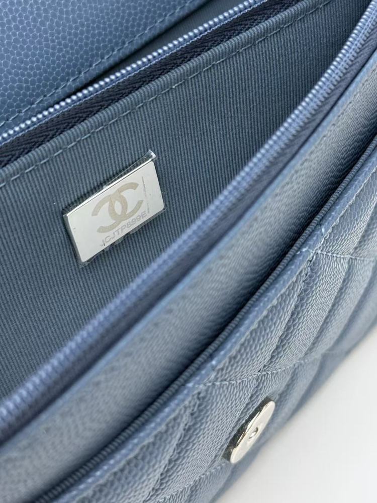 Chanel Wallet on Chain (WOC) crafted in haze blue caviar leather with silver-tone hardware.
