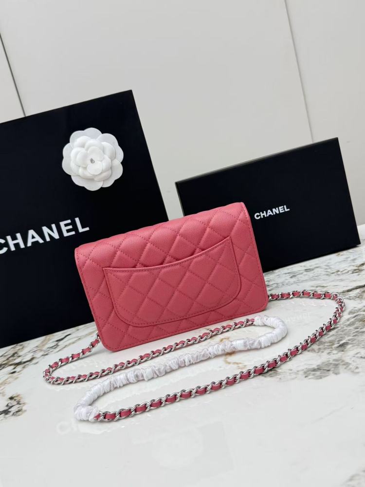 Chanel Wallet on Chain (WOC) crafted in rose pink caviar leather with silver-tone hardware.