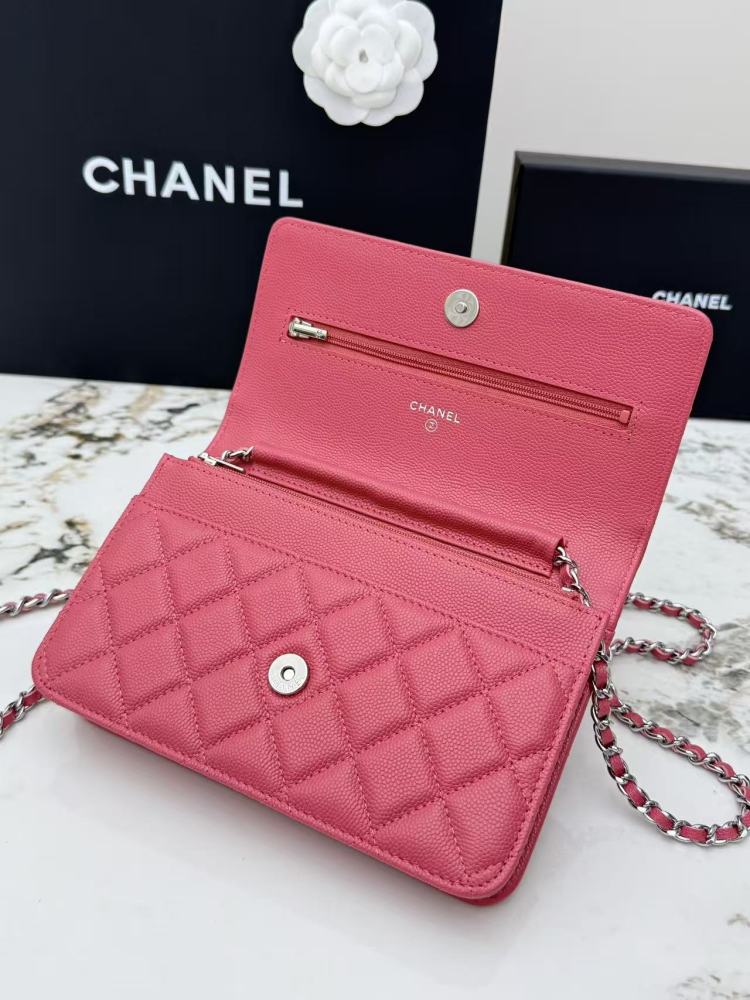Chanel Wallet on Chain (WOC) crafted in rose pink caviar leather with silver-tone hardware.