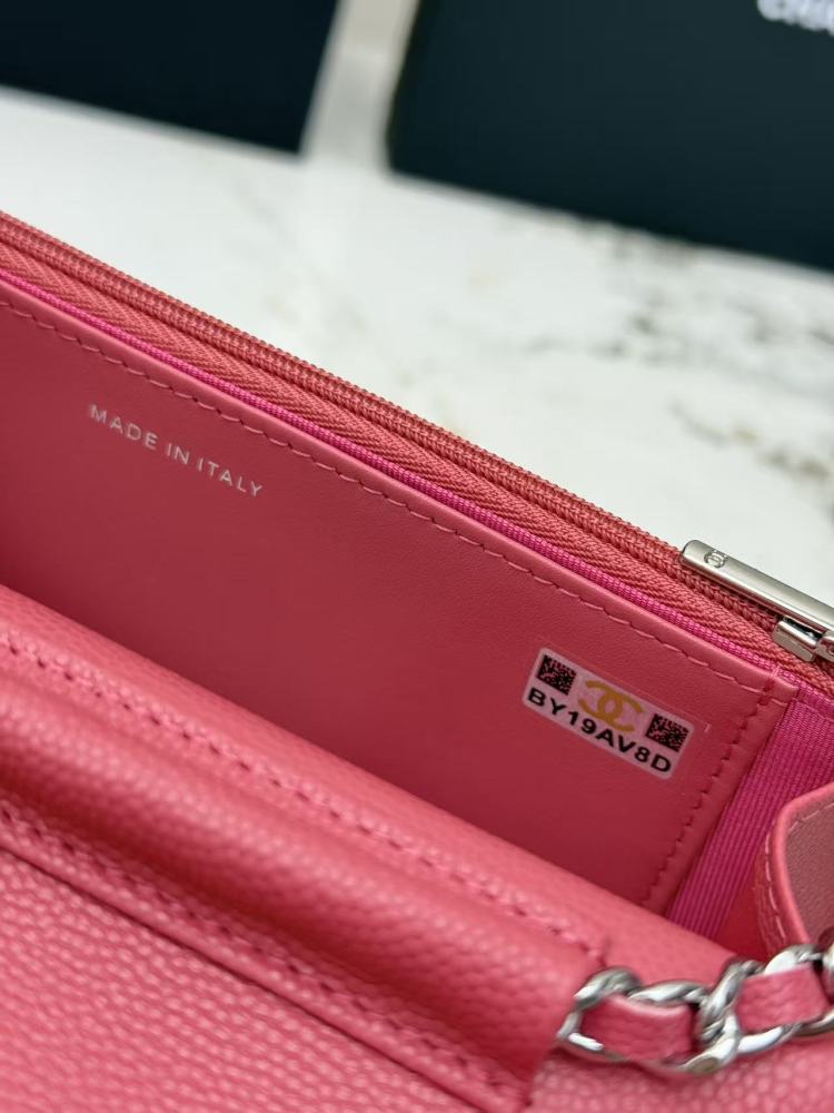 Chanel Wallet on Chain (WOC) crafted in rose pink caviar leather with silver-tone hardware.