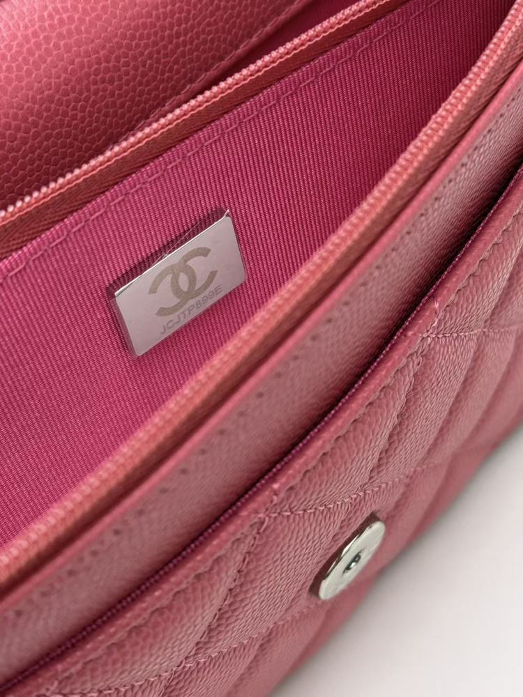 Chanel Wallet on Chain (WOC) crafted in rose pink caviar leather with silver-tone hardware.