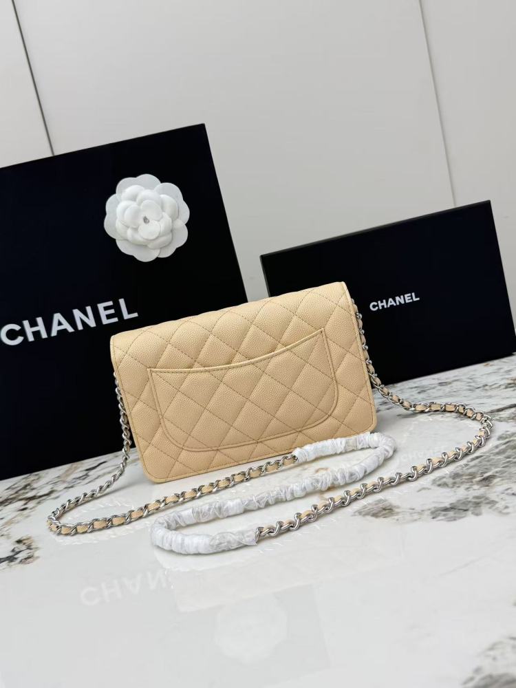 Chanel Wallet on Chain (WOC) crafted in light beige caviar leather with silver-tone hardware.