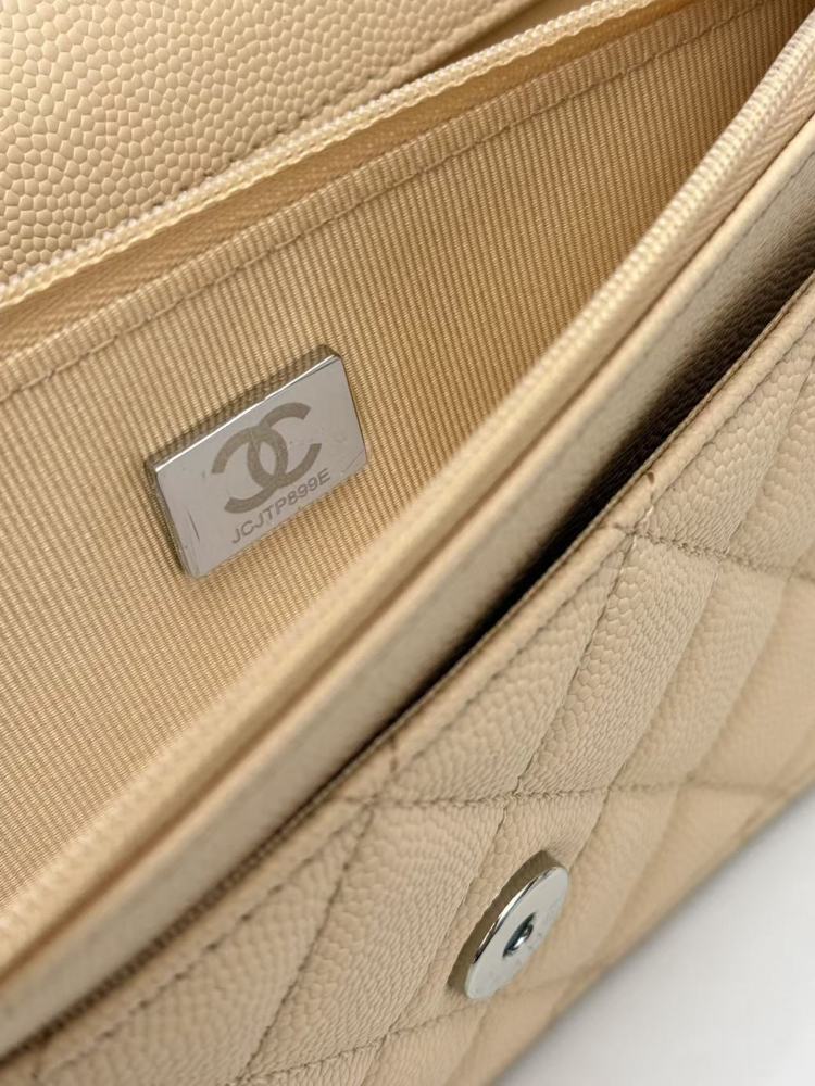 Chanel Wallet on Chain (WOC) crafted in light beige caviar leather with silver-tone hardware.