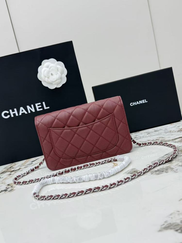 Chanel Wallet on Chain (WOC) crafted in burgundy caviar leather with silver-tone hardware.
