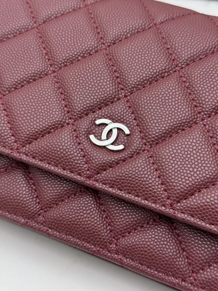 Chanel Wallet on Chain (WOC) crafted in burgundy caviar leather with silver-tone hardware.