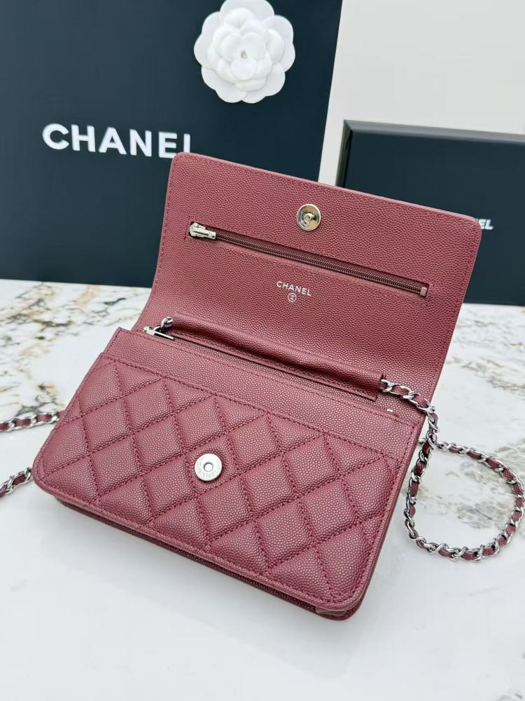 Chanel Wallet on Chain (WOC) crafted in burgundy caviar leather with silver-tone hardware.