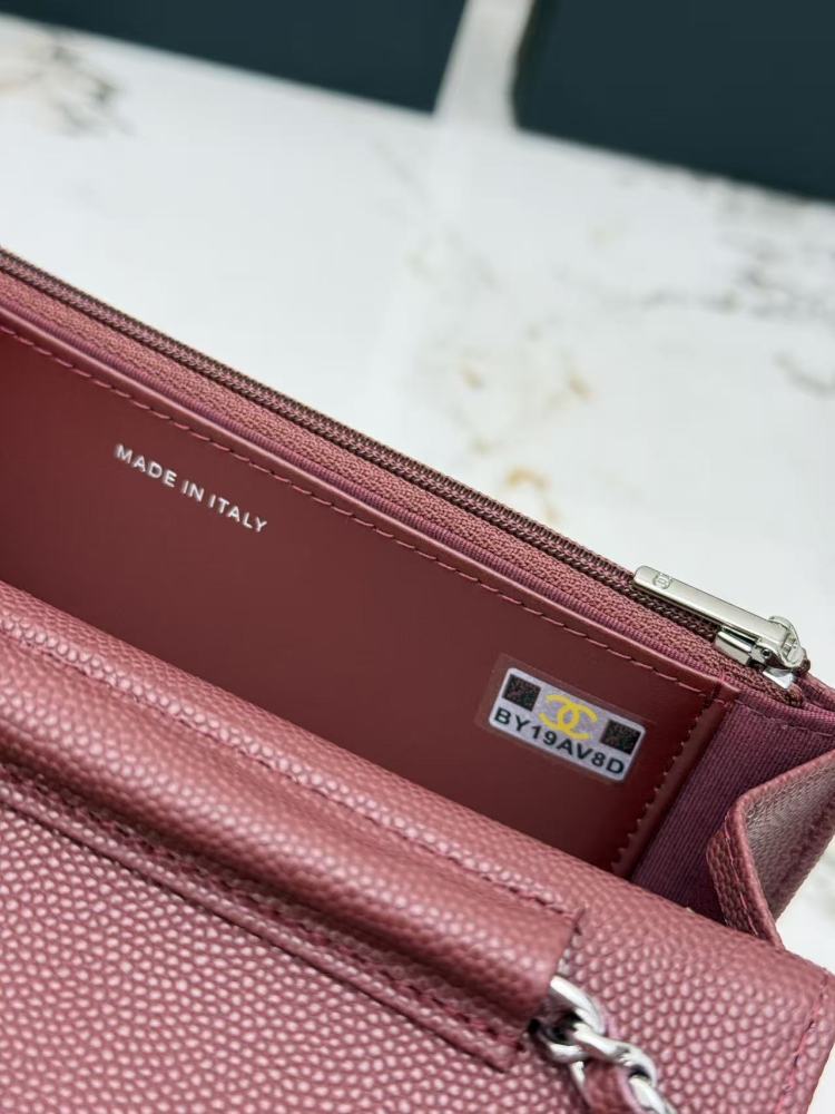 Chanel Wallet on Chain (WOC) crafted in burgundy caviar leather with silver-tone hardware.