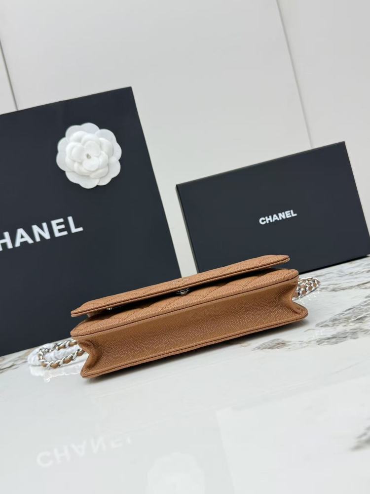Chanel Wallet on Chain (WOC) crafted in caramel/camel caviar leather with silver-tone hardware.