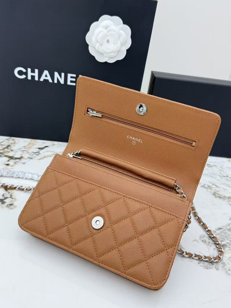 Chanel Wallet on Chain (WOC) crafted in caramel/camel caviar leather with silver-tone hardware.