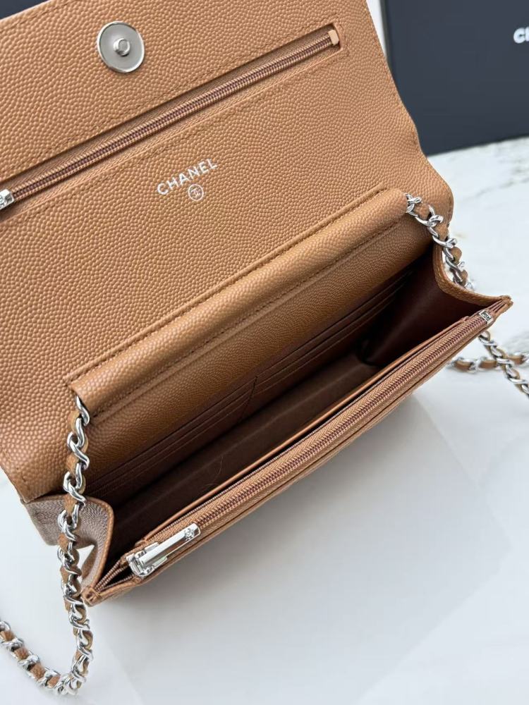 Chanel Wallet on Chain (WOC) crafted in caramel/camel caviar leather with silver-tone hardware.
