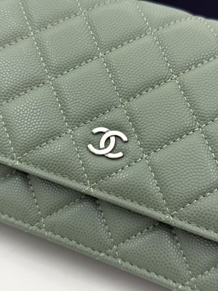 Chanel Wallet on Chain (WOC) crafted in sage green caviar leather with silver-tone hardware.