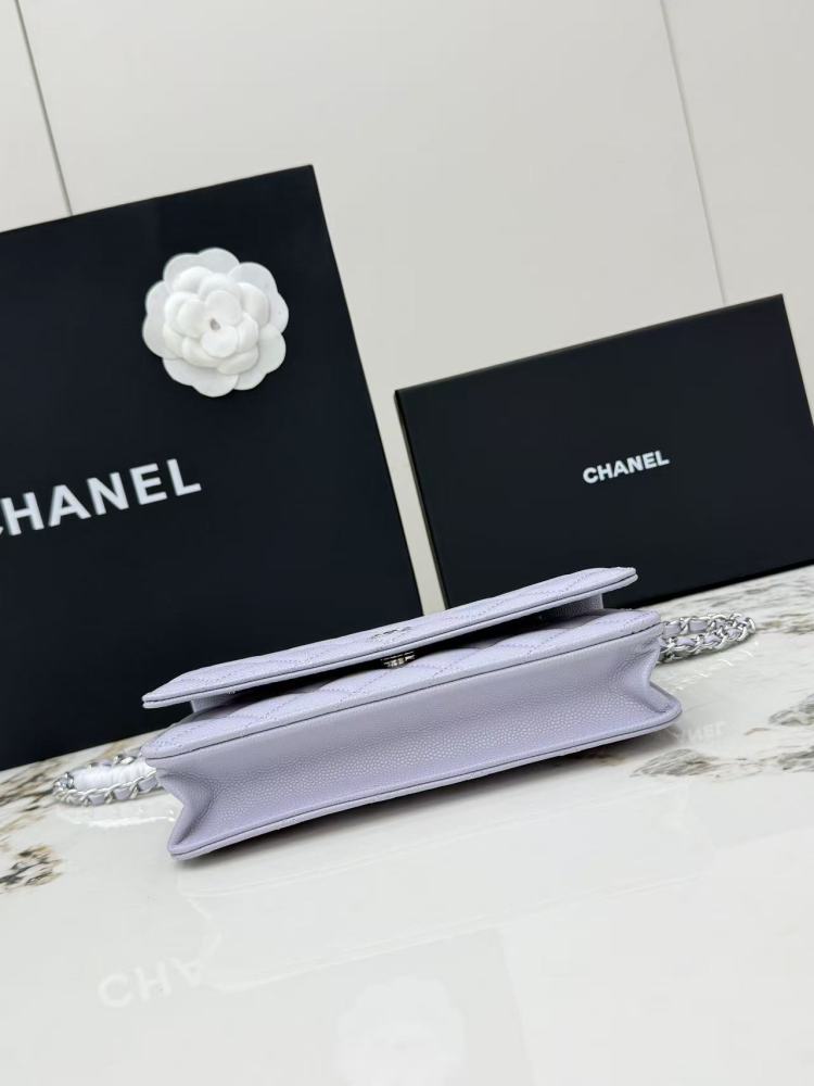 Chanel Wallet on Chain (WOC) crafted in lavender caviar leather with silver-tone hardware.