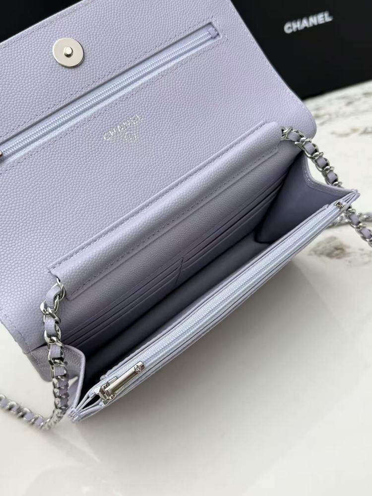 Chanel Wallet on Chain (WOC) crafted in lavender caviar leather with silver-tone hardware.