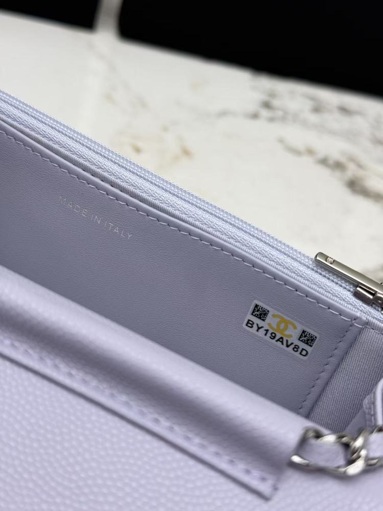 Chanel Wallet on Chain (WOC) crafted in lavender caviar leather with silver-tone hardware.