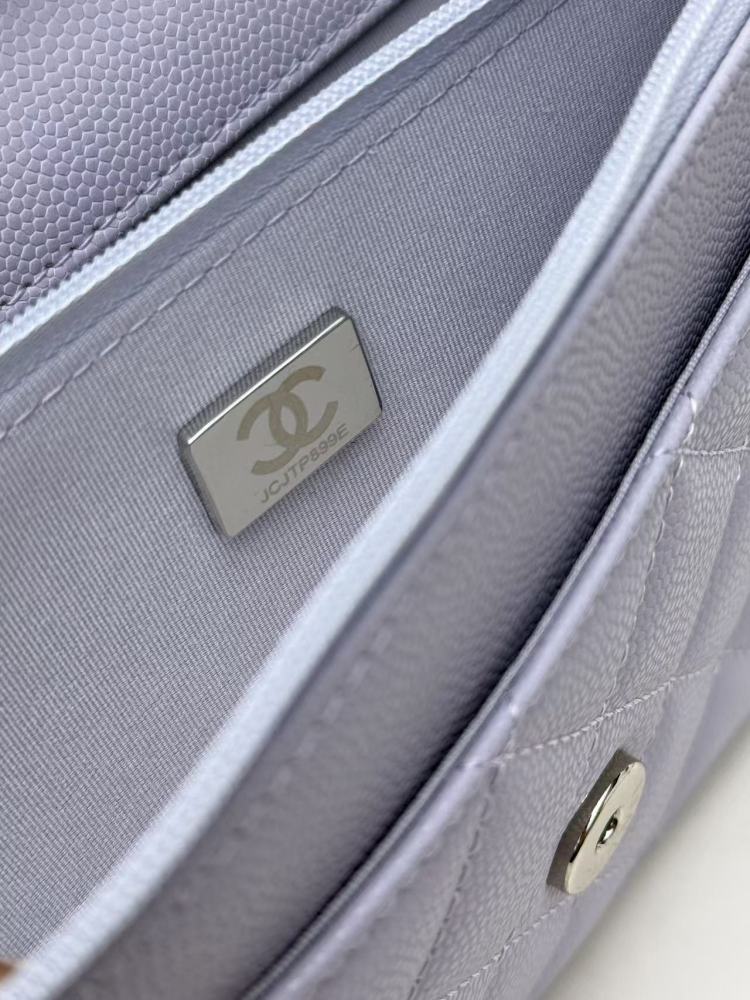 Chanel Wallet on Chain (WOC) crafted in lavender caviar leather with silver-tone hardware.