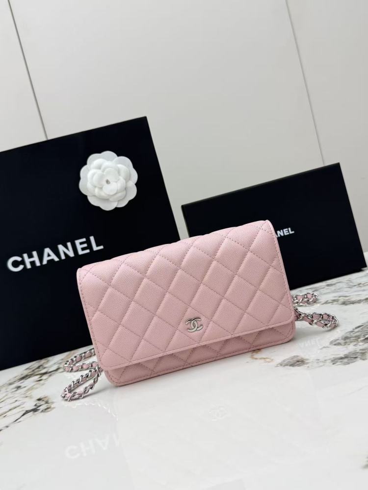 Chanel Wallet on Chain (WOC) crafted in cherry blossom pink caviar leather with silver-tone