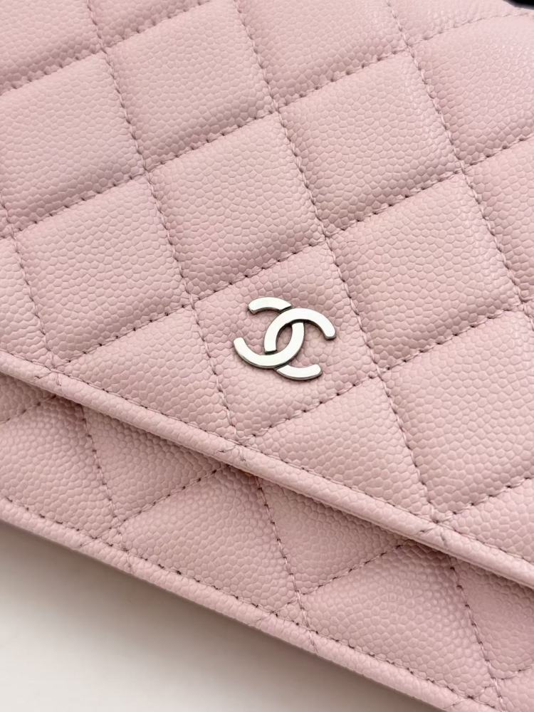 Chanel Wallet on Chain (WOC) crafted in cherry blossom pink caviar leather with silver-tone