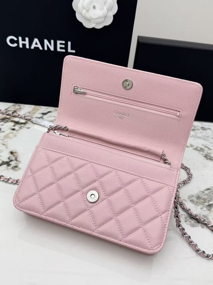 Chanel Wallet on Chain (WOC) crafted in cherry blossom pink caviar leather with silver-tone