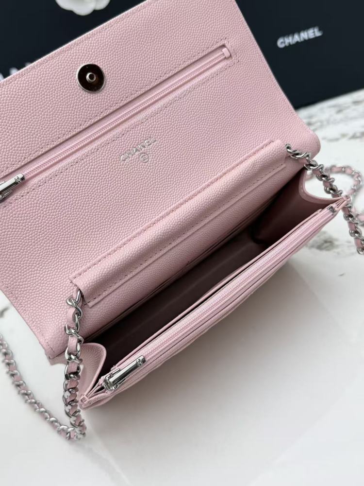Chanel Wallet on Chain (WOC) crafted in cherry blossom pink caviar leather with silver-tone