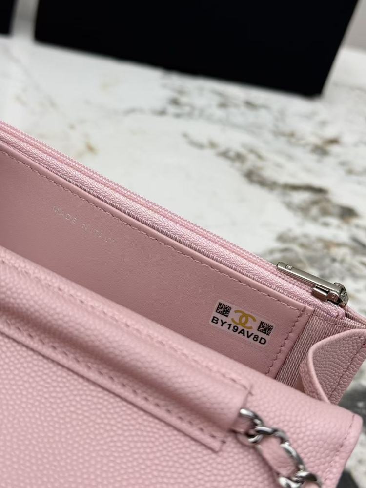Chanel Wallet on Chain (WOC) crafted in cherry blossom pink caviar leather with silver-tone