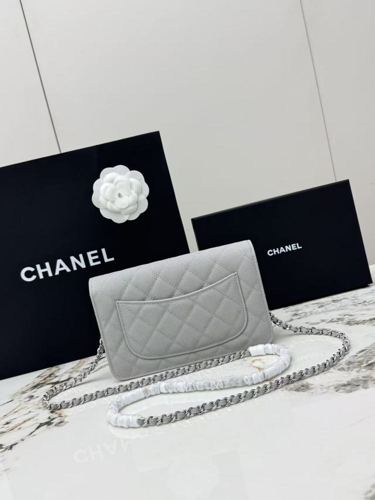 Chanel Wallet on Chain (WOC) crafted in light grey caviar leather with silver-tone hardware.