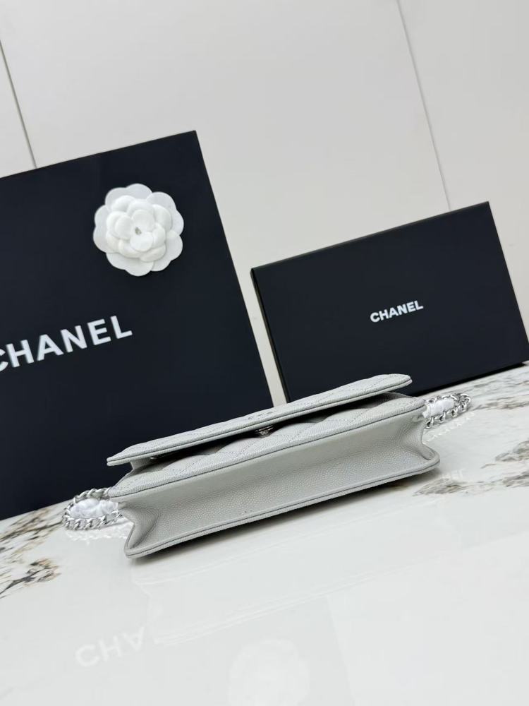 Chanel Wallet on Chain (WOC) crafted in light grey caviar leather with silver-tone hardware.