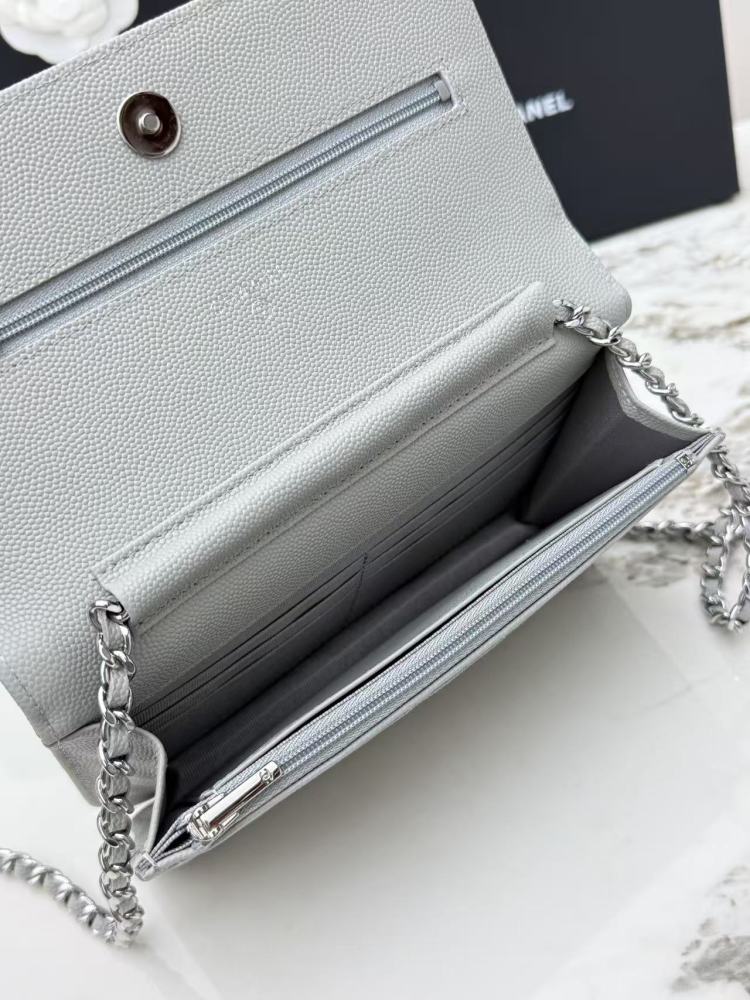 Chanel Wallet on Chain (WOC) crafted in light grey caviar leather with silver-tone hardware.