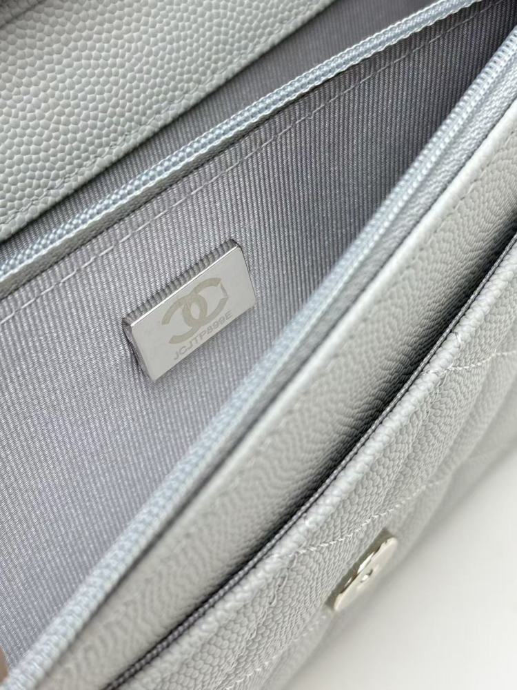 Chanel Wallet on Chain (WOC) crafted in light grey caviar leather with silver-tone hardware.