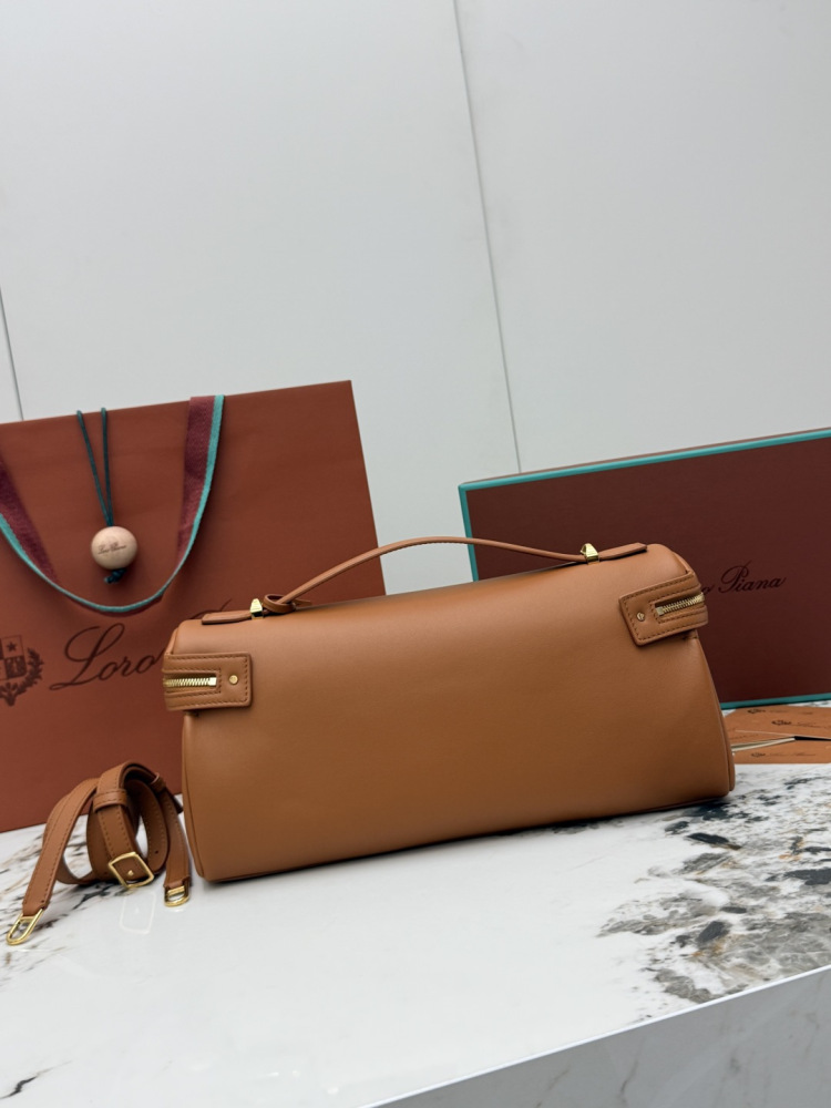 Loro Piana Extra Softy Bag LP33, also known as the "Lunch Box Bag", crafted in warm brown smooth leather with gold-tone hardware.