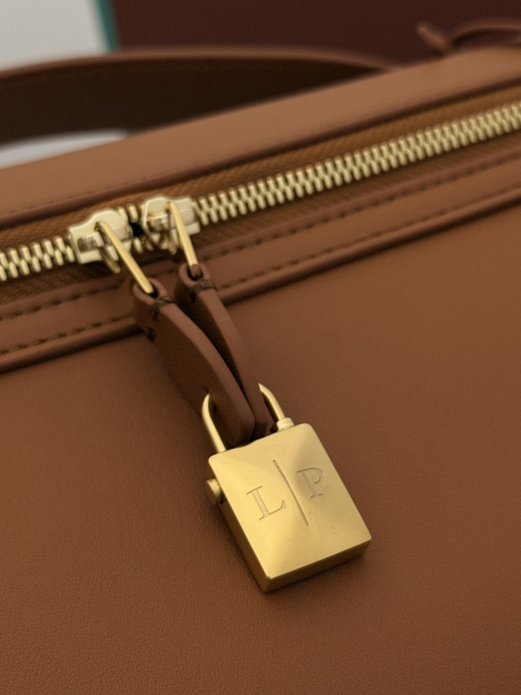 Loro Piana Extra Softy Bag LP33, also known as the "Lunch Box Bag", crafted in warm brown smooth leather with gold-tone hardware.