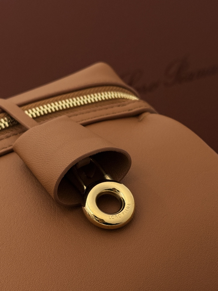 Loro Piana Extra Softy Bag LP33, also known as the "Lunch Box Bag", crafted in warm brown smooth leather with gold-tone hardware.