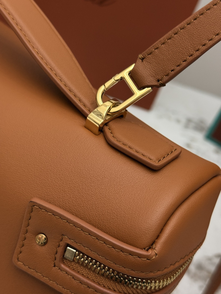 Loro Piana Extra Softy Bag LP33, also known as the "Lunch Box Bag", crafted in warm brown smooth leather with gold-tone hardware.