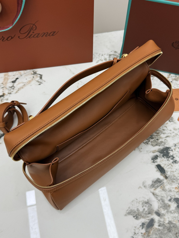 Loro Piana Extra Softy Bag LP33, also known as the "Lunch Box Bag", crafted in warm brown smooth leather with gold-tone hardware.
